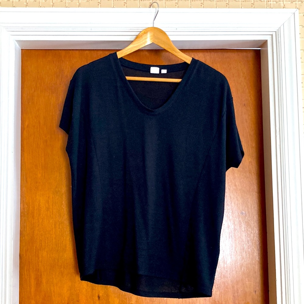 Gap size S black tshirt. Runs large- meant to be baggy. Polyester/rayon/spandex